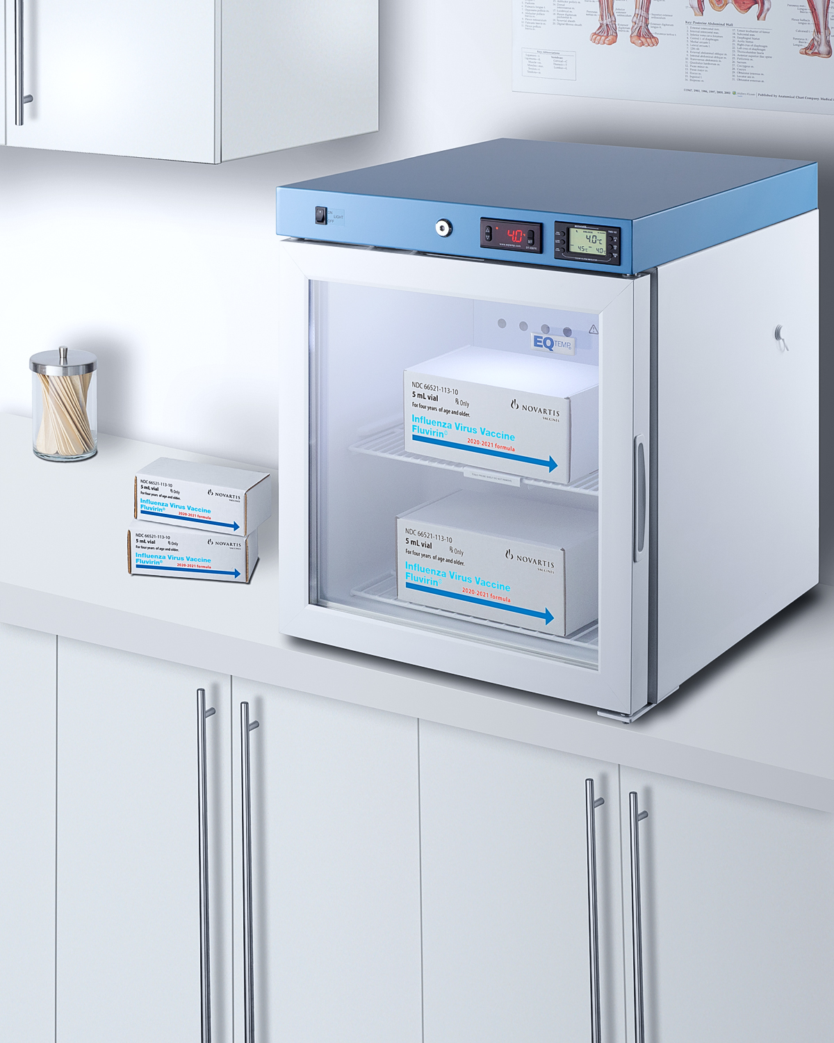 Compact healthcare all-refrigerator with self-closing glass door, front lock, digital controls, and external temperature readout.